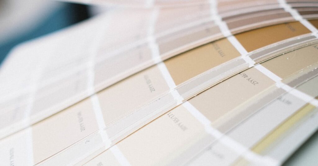pexels-photo-6583367-6583367 Detailed close-up of a multi-colored color swatch palette being fanned out for interior design selection.